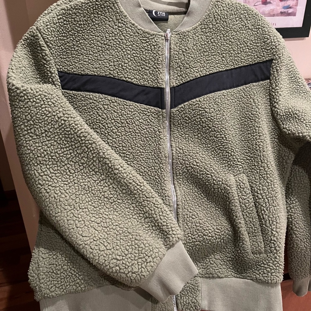 Womens ZYIA Olive Flying V Activewear front zipper.